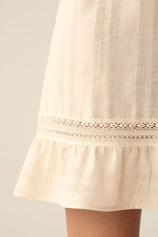Camisola de rayas marfil